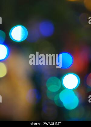 Abstract pattern of to focus colourful lights on a dark background Stock Photo