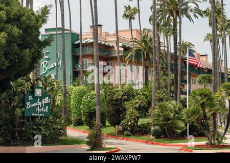 The Beverly Hills Hotel on Sunset Boulevard in Beverly Hills, Los Angeles, California. Hotel exterior in signature pink and green colors. Stock Photo