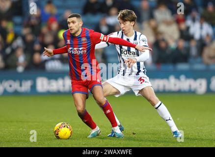 West Bromwich Albion's Harry Whitwell (right) and Aldershot Town's Stuart O'Keefe battle for the ball during the Emirates FA Cup Third Round match at The Hawthorns, West Bromwich. Picture date: Sunday January 7, 2024. Stock Photo