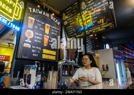 Taipei, Taiwan - October 9 2023 : Taiwnese Beer on Tap served at Raohe Street Marker in Taipei Stock Photo