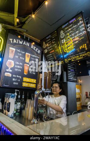 Taipei, Taiwan - October 9 2023 : Taiwnese Beer on Tap served at Raohe Street Marker in Taipei Stock Photo