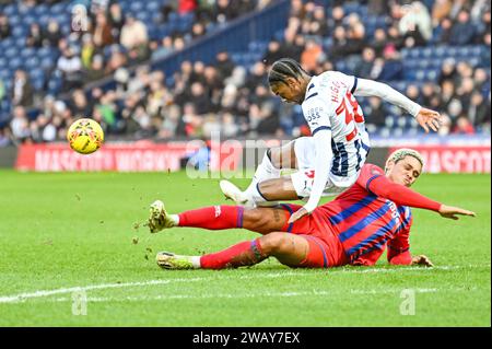 7th January 2024: The Hawthorns, West Bromwich, West Midlands, England; FA Cup Third Round Football, West Bromwich Albion versus Aldershot Town; Akeel Higgins of WBA is tackled by Coby Rowe  of Aldershot Stock Photo