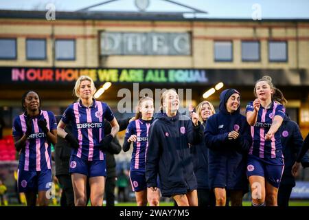 London, UK. 7th January, 2024. Players of Dulwich Hamlet celebrate after winning the London and South East Regional Womens League Cup game between Dulwich Hamlet and Ashford at Champion Hill. Credit: Liam Asman/Alamy Live News Stock Photo