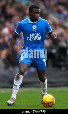 Peterborough United's Kwame Poku during the Emirates FA Cup Third Round match at the Weston Homes Stadium, Peterborough. Picture date: Sunday January 7, 2024. Stock Photo