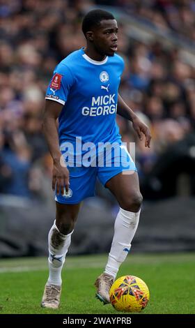 Peterborough United's Kwame Poku during the Emirates FA Cup Third Round match at the Weston Homes Stadium, Peterborough. Picture date: Sunday January 7, 2024. Stock Photo