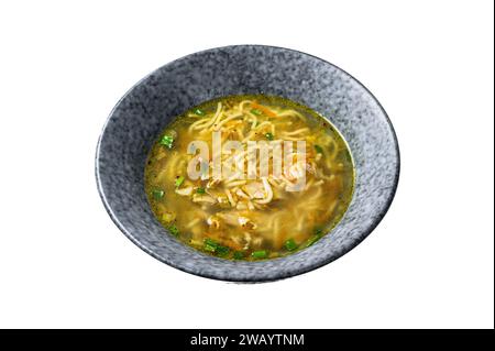 Chicken bouillon soup with leek, carrots, noodles, spring onions and parsley. Isolated on white background, top view Stock Photo