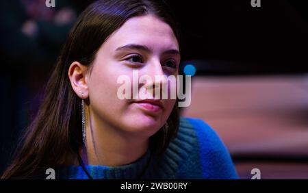 19 yo brown haired girl wearing a blue sweater, Antwerp, Belgium Stock Photo