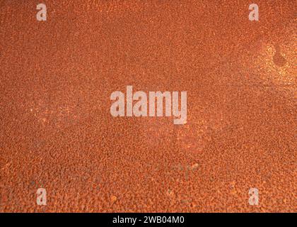 Old abstract light metal texture covered with red rust for background design, horizontal architecture wallpaper or graphic elements. Stock Photo