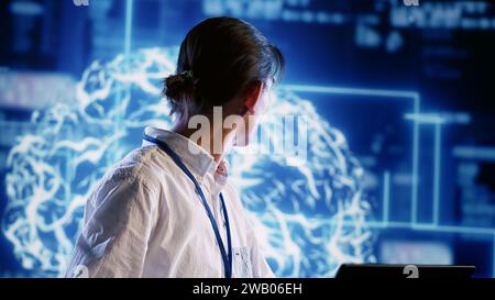 Experienced admin developing artificial intelligence neural networks architecture inspired by human brain. Licensed developer setting up AI machine learning algorithms in high tech startup Stock Photo