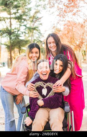 Inspire inclusion IWD2024, diversity with disability feminist group. Heart health hand symbol Stock Photo