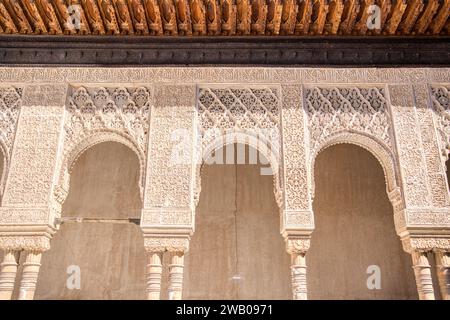 Ornate moorish arched columns carved from stone in an islamic masque Stock Photo