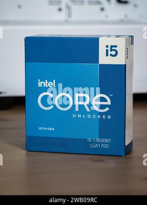 BUDAPEST, HUNGARY- 4 AUGUST, 2023: Closeup view of an Intel i5 13th generation processor unit CPU box on a wooden table Stock Photo