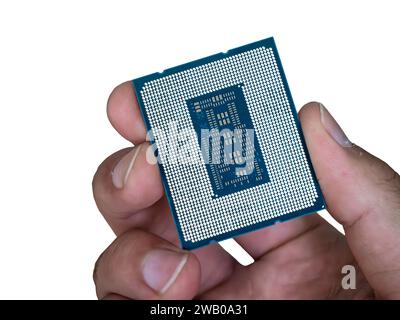 Central Processing Unit (CPU), microprocessor, computer component in hand isolated on white Stock Photo