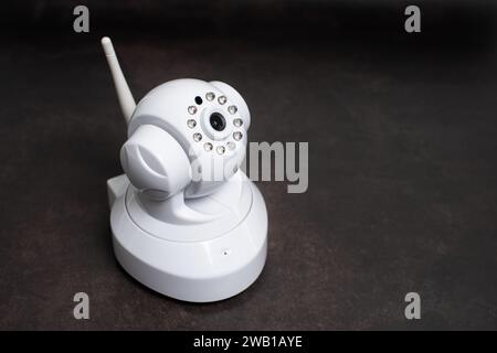 Modern security CCTV IP Camera, wireless IP Camera. Surveillance and monitoring concept. Stock Photo