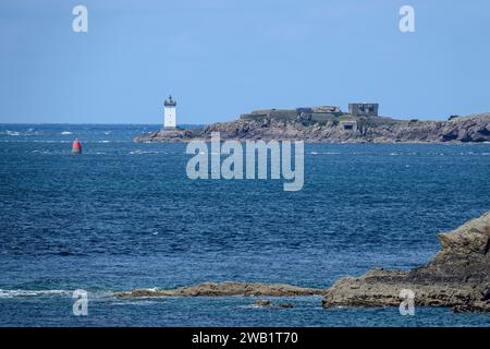 Phare and Fort de Kermorvan near Le Conquet, seen from Pointe Saint-Mathieu, Plougonvelin, Finistere department, Brittany region, France Stock Photo