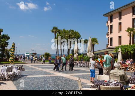Piazza Giosue Carducci near the harbour, Sirmione, Lake Garda, Brescia, Lombardy, Italy Stock Photo
