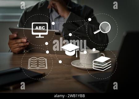 E-learning to graduation student training education course on laptop, online internet lessons, and online webinar Stock Photo
