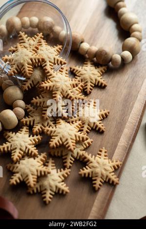 Snowflake cookies on a wooden board Stock Photo