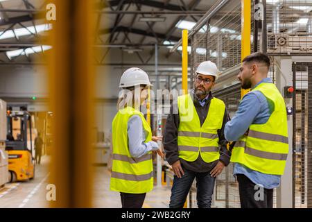 Portrait of workers taking break from work, talking with colleagues and resting. Having friendly conversation with manger. Stock Photo