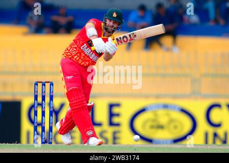 Colombo, Sri Lanka. 08th January 2024. Zimbabwe's Ryan Burl plays a shot during the 2nd one-day international (ODI) cricket match between Sri Lanka vs Zimbabwe at the R. Premadasa Stadium in Colombo on 08th January 2024. Viraj Kothalwala/Alamy Live News Stock Photo