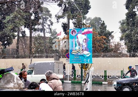 Banner of Imam Khomeini in a street near Imam Khomeini Square in snowing Tehran, Iran. Stock Photo