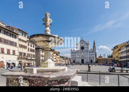 The famous Piazza Santa Croce in the historic center of Florence, Italy, on a sunny day and blue skies Stock Photo