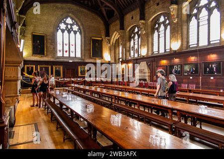 UK, England, Oxfordshire, Oxford, Balliol College, visitors in 1877 Hall designed by Alfred Waterhouse Stock Photo