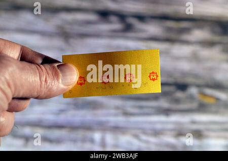 Cairo, Egypt, January 6 2024: Cairo Metro underground subway ticket used to cross the gateway and use the train, The Cairo Metro is the rapid transit Stock Photo