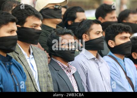 Dhaka, Bangladesh. 08th Jan, 2024. Members of the Bangladesh Gono Odhikar Parishad party wearing black face bands take part in a protest to condemn the general election, in Dhaka on January 8, 2024. Bangladesh's Prime Minister Sheikh Hasina has won a fifth term in power with her party taking three-quarters of seats in parliament. Photo by Suvra Kanti Das/ABACAPRESS.COM Credit: Abaca Press/Alamy Live News Stock Photo