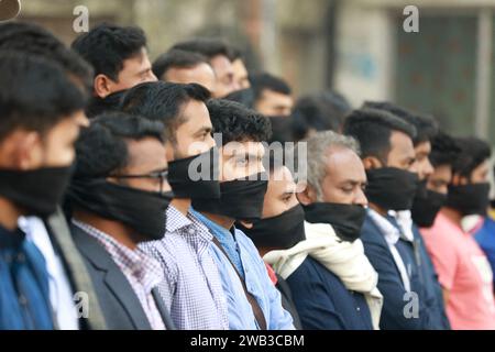 Dhaka, Bangladesh. 08th Jan, 2024. Members of the Bangladesh Gono Odhikar Parishad party wearing black face bands take part in a protest to condemn the general election, in Dhaka on January 8, 2024. Bangladesh's Prime Minister Sheikh Hasina has won a fifth term in power with her party taking three-quarters of seats in parliament. Photo by Suvra Kanti Das/ABACAPRESS.COM Credit: Abaca Press/Alamy Live News Stock Photo