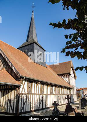Typical timber-framed church and graveyard in Outines, Marne department, région Grand-Est, France Stock Photo