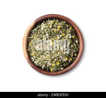 Chamomile dried tea leaves and flowers in a bowl isolated over white background. Stock Photo