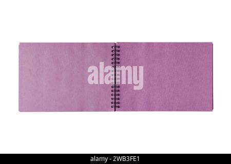 Open spiral bound notepad with two craft pink sheets, isolated on white background. Top view, copy space for text, template, mockup Stock Photo