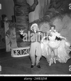 Annalisa Ericson, 1913-2011, Swedish actress and revue performer and one of the big names in Swedish film between the 1930s and 1950s. Here with co-star Nils Poppe during a performance Where is Charley that Södra teatern put on in 1950. Kristoffersson ref BA34-5 Stock Photo