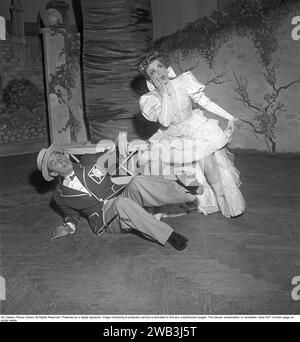 Annalisa Ericson, 1913-2011, Swedish actress and revue performer and one of the big names in Swedish film between the 1930s and 1950s. Here with co-star Nils Poppe during a performance Where is Charley that Södra teatern put on in 1950. Kristoffersson ref BA34-9 Stock Photo