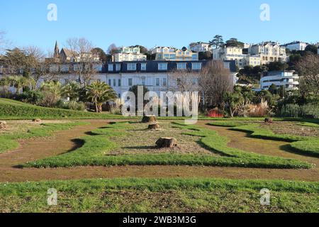 The stumps of the iconic palm trees in Abbey Park Gardens (Italian Gardens) on the seafront at Torquay, South Devon. Stock Photo