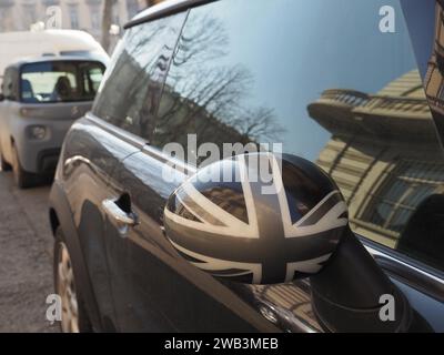 TURIN, ITALY - CIRCA FEBRUARY 2023: Black And White Mini Cooper Car Stock Photo