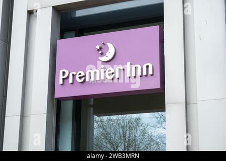 Edinburgh, United Kingdom. 17 March 2017 : Premier Inn, Logo sign from exterior shop on Princes Street. It is a British hotel chain and the UK's large Stock Photo