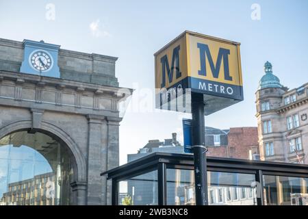 Newcastle, England - 2 October 2017: Metro Sign in front of the station. Tyne and Wear Metro, a rapid transit and light rail system in North East Engl Stock Photo