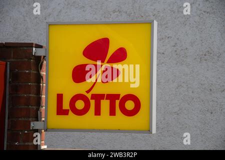 Husum, Germany  14 May 2023,  The logo of 'Lotto' lottery in front of a branch Stock Photo