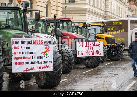 Munich, Germany. 08th Jan, 2024. On 8 January 2024, thousands of farmers, gathered on Odeonsplatz in Munich, Germany to protest against the austerity plans and the removal of subsidies of the so called traffic light government in the agricultuer sector. Many of them arrived by tractor, which were parked along Ludwigsstrasse and Leopoldstrasse from Odeonsplatz. Protests are planned throughout Germany for the whole week. (Photo by Alexander Pohl/Sipa USA) Credit: Sipa USA/Alamy Live News Stock Photo