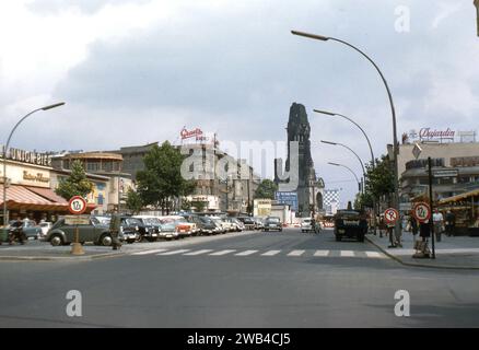 Street scene in Berlin, circa 1958. Kurfürstendamm at the corner of Meinekestrasse. In the background, the Church of Remembrance. Stock Photo