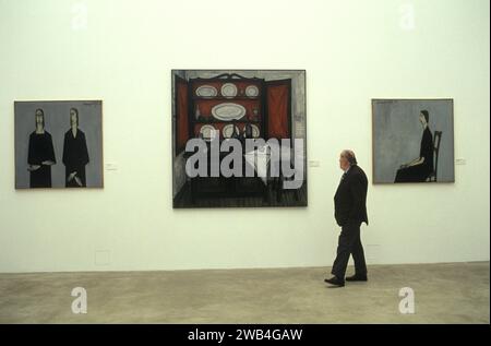 Bernard Buffet French artist expressionist painter (1928-1999) . Kassal Germany at his one man exhibition, he is checking paintings before the opening. 1994 1990s HOMER SYKES Stock Photo