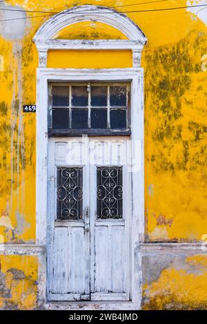 Old door of a decayed colonial building, Historic centre, Merida Mexico Stock Photo