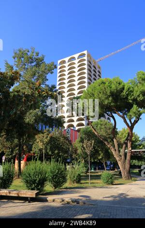 September 09 2023 - Tirana in Albania: Buildigs in the centre of the City with local people and tourists Stock Photo