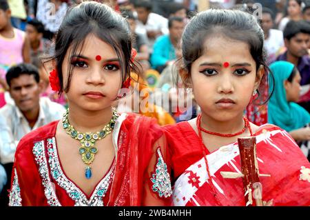 Portrait of two girls during the New year celebrations. Shahbag, Dhaka. Bangladesh. Stock Photo