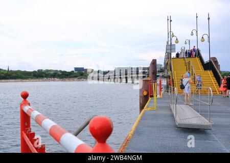 July 29 2023 - Misdroy, Miedzyzdroje in Poland: the pier into the Baltic Sea Stock Photo