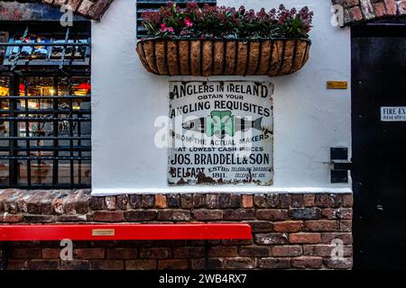 The Commercial Court in the Cathedral Quarter of Belfast, Northern Ireland. Once the commercial heart of the city, it is decorated with old mementoes. Stock Photo