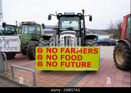 Farmer protest, denounce government plan for abolish agricultural diesel and vehicle tax exemptions, demonstration with tractors in the city of Trier, Stock Photo