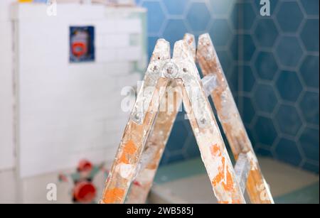 Stepladder in empty bathroom during improvement works Stock Photo
